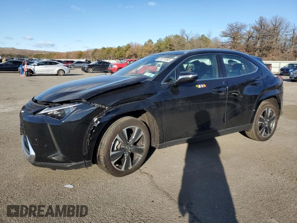 2023 Lexus UX 250h Premium с VIN JTHP9JBH8P2069805, выставлен на аукционе Copart как лот 87671095 с пробегом 12 599 миль миль и Списание • Salvage title. История ставок и продаж доступна на DreamBid. Изображение 1.