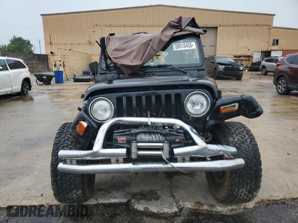 2002 Jeep Wrangler Sahara with VIN 1J4FA59SX2P747327, listed as a Copart auction lot 59515455 with 79,964 mi miles and Salvage title. Bid and sale history available at DreamBid. Image 5.