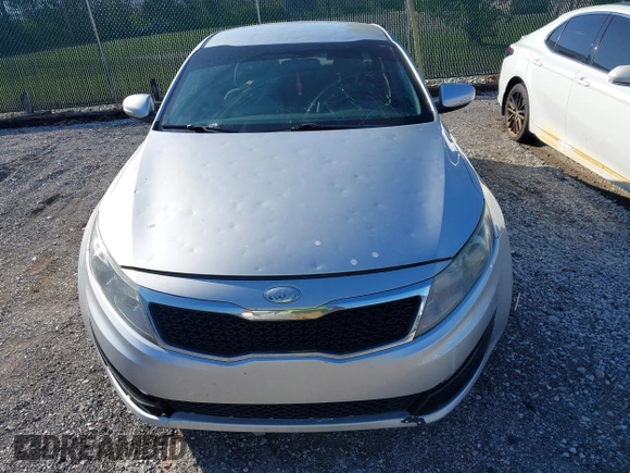 2013 Kia Optima LX with VIN 5XXGM4A79DG199785, listed as a IAAI auction lot 42015820 with 137,202 mi miles. Bid and sale history available at carsss.com. Image 12.