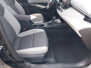2023 Toyota Corolla LE with VIN 5YFB4MDE7PP028548, listed as a IAAI auction lot 41810081 with 34,352 mi miles and . Bid and sale history available at DreamBid. Image 5.
