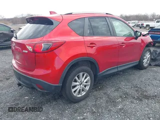 2015 Mazda CX-5 Touring with VIN JM3KE2CY7F0533731, listed as a IAAI auction lot 41876211 with 1 mi miles. Bid and sale history available at carsss.com. Image 4.