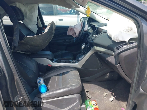 2013 Ford Escape SEL with VIN 1FMCU0HXXDUD51754, listed as a IAAI auction lot 42696434 with 145,705 mi miles and . Bid and sale history available at DreamBid. Image 5.