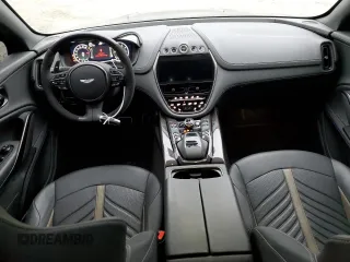 2023 Aston Martin DBX 707 z VIN SD7VUJBW5PTV06160, wystawiony jako Copart lot #76512973 z przebiegiem Nie podano mil oraz . Historia ofert i sprzedaży dostępna na DreamBid. Obrazek 8.