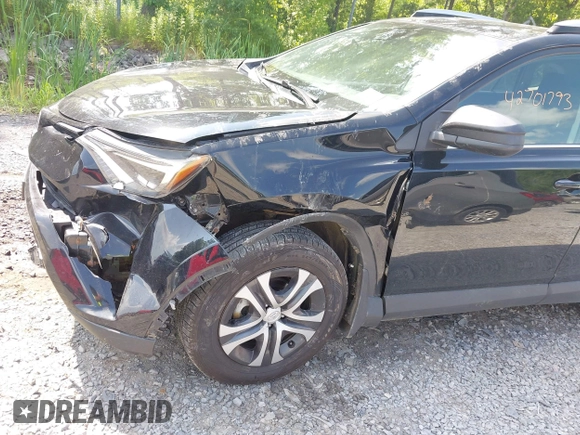 2017 Toyota RAV4 LE with VIN 2T3BFREV5HW651308, listed as a IAAI auction lot 42701783 with 112,829 mi miles and . Bid and sale history available at DreamBid. Image 6.