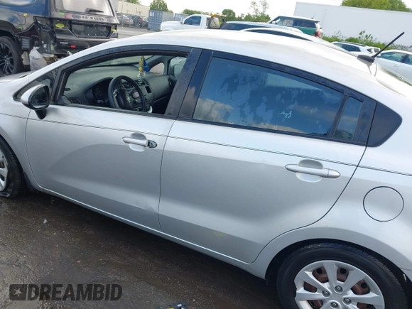 2014 Kia Rio LX with VIN KNADM4A31E6413780, listed as a IAAI auction lot 41996928 with 93,446 mi miles and . Bid and sale history available at DreamBid. Image 14.