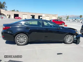 2014 Lexus ES 330 z VIN JTHBK1GG6E2151432, wystawiony jako IAAI lot #42327631 z przebiegiem 179 535 mil mil oraz . Historia ofert i sprzedaży dostępna na DreamBid. Obrazek 13.