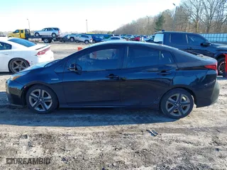 2019 Toyota Prius L Eco with VIN JTDKARFU9K3091887, listed as a IAAI auction lot 41282017 with 240,000 mi miles. Bid and sale history available at carsss.com. Image 14.