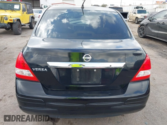 2009 Nissan Versa 1.8 S with VIN 3N1BC11E09L450167, listed as a IAAI auction lot 41711284 with 91,216 mi miles. Bid and sale history available at carsss.com. Image 16.