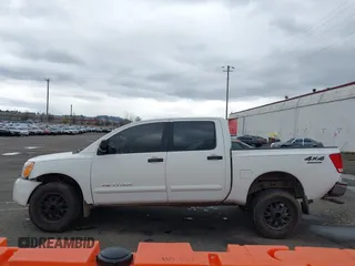 2013 Nissan Titan PRO-4X with VIN 1N6BA0EC9DN301669, listed as a IAAI auction lot 41868397 with 171,085 mi miles. Bid and sale history available at carsss.com. Image 14.