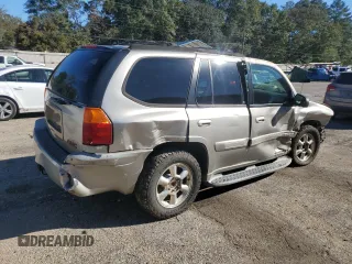 2002 GMC Envoy SLT with VIN 1GKDS13SX22301062, listed as a Copart auction lot 81791024 with 0 mi miles and Salvage Title. Bid and sale history available at carsss.com. Image 3.