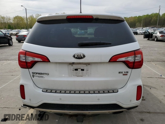 2014 Kia Sorento SX z VIN 5XYKWDA7XEG465848, wystawiony jako Copart lot #53256035 z przebiegiem 76 457 mil mil oraz Szkoda całkowita • Salvage title. Historia ofert i sprzedaży dostępna na DreamBid. Obrazek 6.