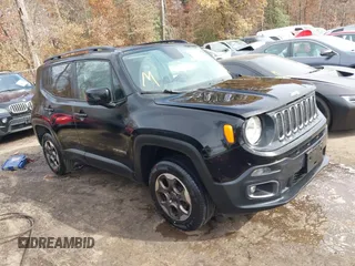 2015 Jeep Renegade Latitude with VIN ZACCJBBH2FPC25869, listed as a IAAI auction lot 40734359 with 128,475 mi miles. Bid and sale history available at carsss.com. Image 1.