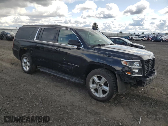 2018 Chevrolet Suburban LT with VIN 1GNSKHKC0JR266132, listed as a Copart auction lot 51337275 with 197,386 mi miles and Salvage Title. Bid and sale history available at DreamBid. Image 4.