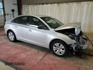 2015 Chevrolet Cruze LS with VIN 1G1PA5SG0F7185162, listed as a Copart auction lot 57080495 with 63,811 mi miles and Salvage Title. Bid and sale history available at DreamBid. Image 4.