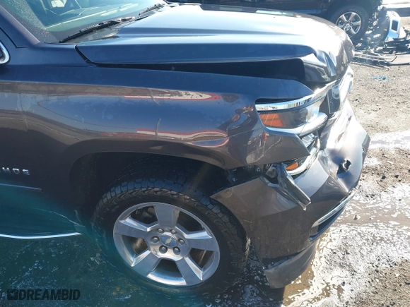 2018 Chevrolet Tahoe Premier with VIN 1GNSCCKC5JR204676, listed as a IAAI auction lot 41731192 with 130,528 mi miles. Bid and sale history available at carsss.com. Image 18.