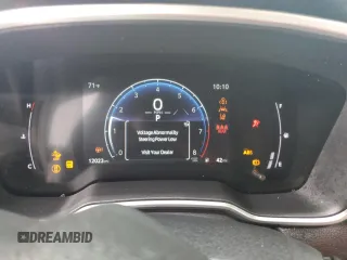 2024 Toyota Corolla Cross XLE z VIN 7MUDAAAG4RV102983, wystawiony jako Copart lot #50891575 z przebiegiem 12 023 mil mil oraz Szkoda całkowita • Salvage title. Historia ofert i sprzedaży dostępna na DreamBid. Obrazek 9.