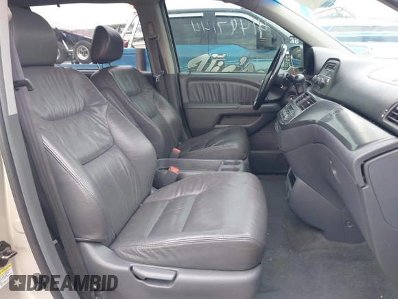 2006 Honda Odyssey EX-L z VIN 5FNRL38766B018014, wystawiony jako IAAI lot #41497144 z przebiegiem 230 225 mil mil oraz . Historia ofert i sprzedaży dostępna na DreamBid. Obrazek 5.