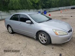 2003 Honda Accord LX with VIN 1HGCM563X3A105970, listed as a Copart auction lot 60074655 with 125,443 mi miles and Salvage title. Bid and sale history available at DreamBid. Image 4.