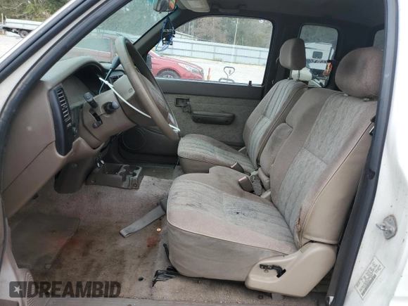 1999 Toyota Tacoma z VIN 4TAVL52N6XZ555376, wystawiony jako Copart lot #85763154 z przebiegiem 229 914 mil mil oraz Nie do naprawy • Non repairable. Historia ofert i sprzedaży dostępna na DreamBid. Obrazek 7.