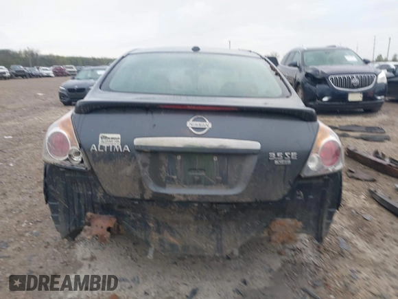 2009 Nissan Altima SE z VIN 1N4BL21E49C179974, wystawiony jako IAAI lot #42058454 z przebiegiem 196 351 mil mil oraz . Historia ofert i sprzedaży dostępna na DreamBid. Obrazek 16.
