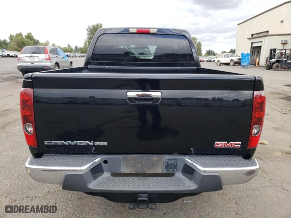 2012 GMC Canyon SLE1 with VIN 1GTH6MFE4C8107716, listed as a Copart auction lot 67265344 with 80,350 mi miles and Salvage Title. Bid and sale history available at carsss.com. Image 6.