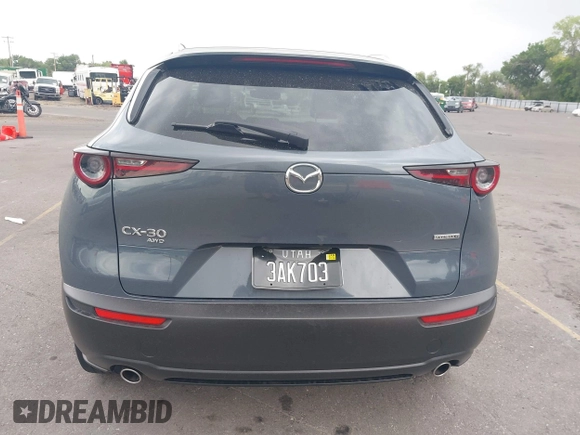 2022 Mazda CX-30 S Carbon Edition with VIN 3MVDMBCL6NM431985, listed as a IAAI auction lot 42610558 with Not provided miles and . Bid and sale history available at DreamBid. Image 15.