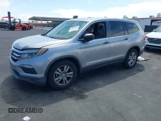 2016 Honda Pilot LX with VIN 5FNYF5H10GB044006, listed as a IAAI auction lot 42075404 with 129,642 mi miles and . Bid and sale history available at DreamBid. Image 2.