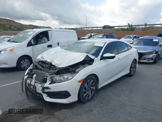 2018 Honda Civic EX with VIN 19XFC2F76JE206191, listed as a IAAI auction lot 41949231 with 146,118 mi miles and . Bid and sale history available at DreamBid. Image 2.
