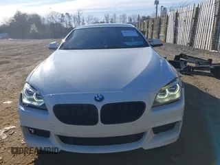 2015 BMW 6 Series 650i with VIN WBA6B2C54FGB99173, listed as a IAAI auction lot 41692594 with 123,664 mi miles and . Bid and sale history available at carsss.com. Image 13.