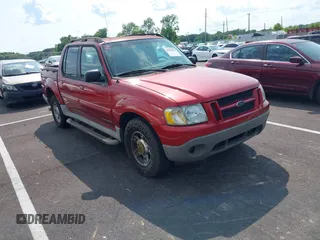 2001 Ford Explorer Sport Trac z VIN 1FMZU67E51UC90080, wystawiony jako IAAI lot #42358168 z przebiegiem 194 857 mil mil oraz . Historia ofert i sprzedaży dostępna na DreamBid. Obrazek 1.