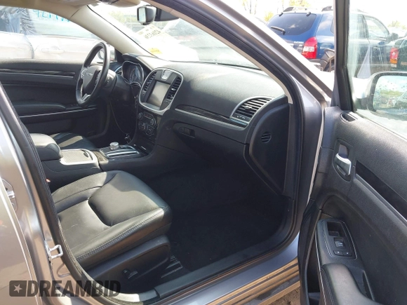 2016 Chrysler 300 Anniversary Edition with VIN 2C3CCAAG4GH238255, listed as a IAAI auction lot 42163236 with 253,452 mi miles and . Bid and sale history available at DreamBid. Image 5.