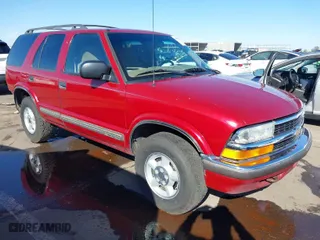 1999 Chevrolet Blazer LS with VIN 1GNDT13W4X2189191, listed as a IAAI auction lot 41809068 with 251,307 mi miles. Bid and sale history available at carsss.com. Image 1.