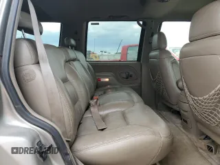 1999 GMC Yukon with VIN 1GKEK13R9XJ787877, listed as a Copart auction lot 72185044 with 191,710 mi miles and Salvage Title. Bid and sale history available at carsss.com. Image 11.