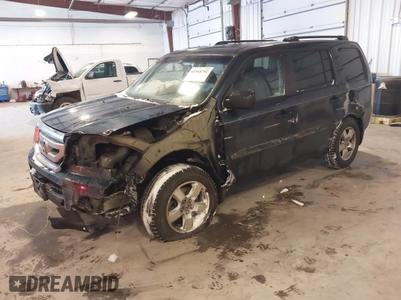 2009 Honda Pilot EX-L with VIN 5FNYF48579B044150, listed as a IAAI auction lot 41568792 with 244,763 mi miles. Bid and sale history available at carsss.com. Image 2.