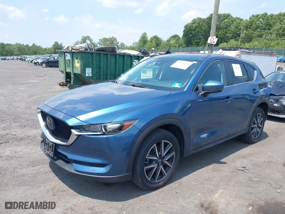 2018 Mazda CX-5 Touring with VIN JM3KFBCM3J0424797, listed as a IAAI auction lot 39864455 with 67,720 mi miles. Bid and sale history available at carsss.com. Image 17.