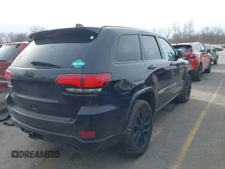 2017 Jeep Grand Cherokee Laredo with VIN 1C4RJFAG7HC873211, listed as a IAAI auction lot 40849066 with 139,430 mi miles. Bid and sale history available at carsss.com. Image 4.