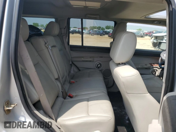 2006 Jeep Commander Limited with VIN 1J8HH58256C366079, listed as a Copart auction lot 51107395 with 176,738 mi miles and Salvage title. Bid and sale history available at DreamBid. Image 11.
