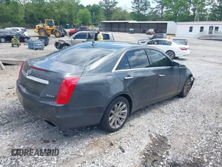 2014 Cadillac CTS Sedan RWD with VIN 1G6AP5SX2E0188411, listed as a IAAI auction lot 42106784 with 151,171 mi miles. Bid and sale history available at carsss.com. Image 4.