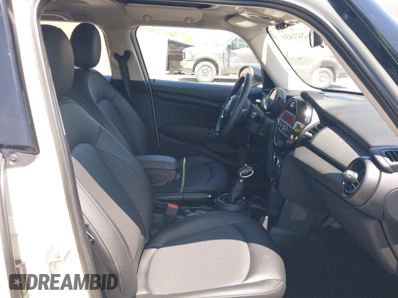 2016 MINI Hardtop 4 Door with VIN WMWXU1C56G2D10605, listed as a IAAI auction lot 42411431 with 35,367 mi miles and . Bid and sale history available at DreamBid. Image 5.