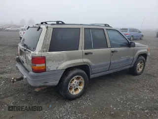 1997 Jeep Grand Cherokee Laredo with VIN 1J4GZ58Y5VC637350, listed as a Copart auction lot 77405444 with 182,482 mi miles and Clean Title. Bid and sale history available at carsss.com. Image 3.