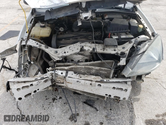 2004 Ford Focus SE with VIN 1FAFP34344W113759, listed as a Copart auction lot 51386335 with 148,267 mi miles and Salvage title. Bid and sale history available at DreamBid. Image 13.