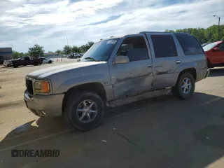 1999 GMC Denali with VIN 1GKEK13R0XR916686, listed as a Copart auction lot 61120914 with 240,605 mi miles and Salvage Title. Bid and sale history available at carsss.com. Image 1.
