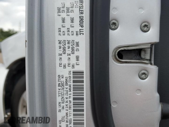 2012 Ram 1500 Express with VIN 1C6RD7KT1CS142370, listed as a Copart auction lot 60756925 with 106,627 mi miles and Salvage title. Bid and sale history available at DreamBid. Image 12.
