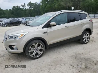 2017 Ford Escape Titanium with VIN 1FMCU0J95HUB96659, listed as a Copart auction lot 54053775 with 69,744 mi miles and Salvage Title. Bid and sale history available at DreamBid. Image 1.