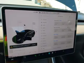 2019 Tesla Model 3 Mid Range with VIN 5YJ3E1EA2KF305834, listed as a IAAI auction lot 41719610 with 126,333 mi miles and . Bid and sale history available at DreamBid. Image 18.