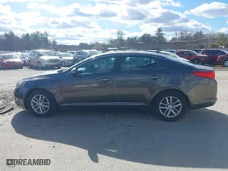 2012 Kia Optima LX with VIN 5XXGM4A72CG083861, listed as a IAAI auction lot 41909434 with 124,526 mi miles. Bid and sale history available at carsss.com. Image 14.