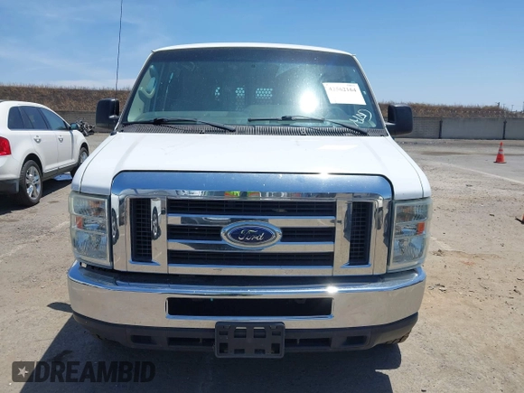 2013 Ford Econoline Cargo Commercial with VIN 1FTNE2EW2DDA31328, listed as a IAAI auction lot 42562164 with 133,729 mi miles and . Bid and sale history available at DreamBid. Image 12.