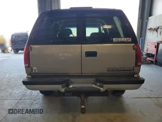 1999 Chevrolet Tahoe Z71 z VIN 1GNEK13R2XJ338897, wystawiony jako Copart lot #54219225 z przebiegiem 232 020 mil mil oraz Szkody całkowita. Historia ofert i sprzedaży dostępna na DreamBid. Obrazek 6.