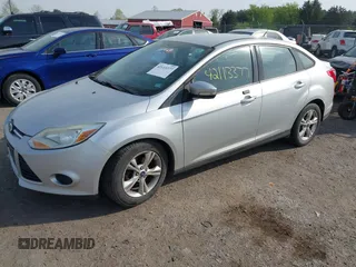 2014 Ford Focus SE with VIN 1FADP3F27EL396785, listed as a IAAI auction lot 42113377 with 147,851 mi miles. Bid and sale history available at carsss.com. Image 2.