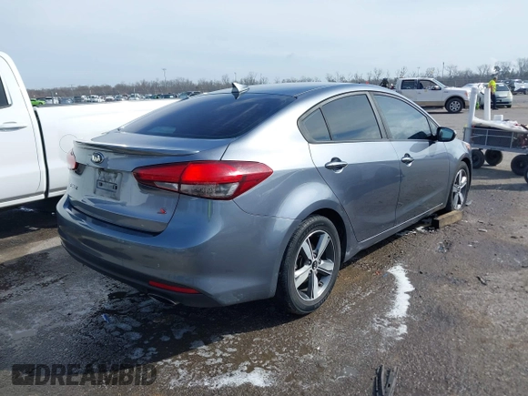 2018 Kia Forte LX with VIN 3KPFL4A79JE194864, listed as a IAAI auction lot 41657793 with 128,256 mi miles and . Bid and sale history available at DreamBid. Image 4.